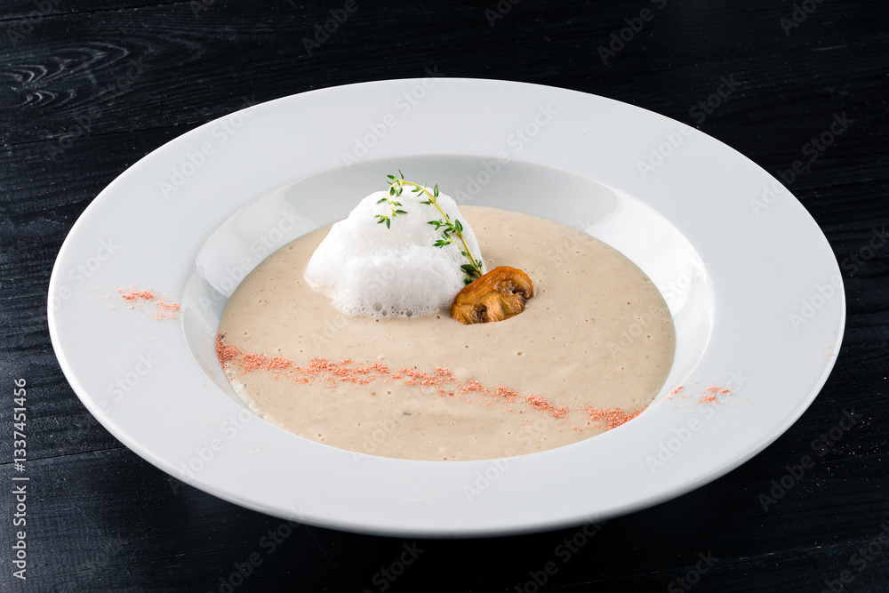 Delicious cream soup with mushrooms