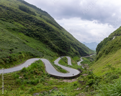 Stunning view of road and landscape on motorcycle trip through the HA GIANG loop, Vietnam