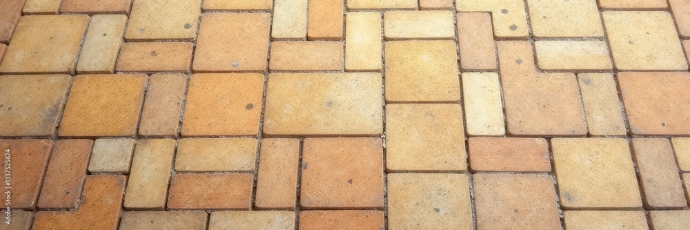 Naklejka premium Warm beige mosaic tile street pavement Abstract stone texture background , backdrop, outdoor