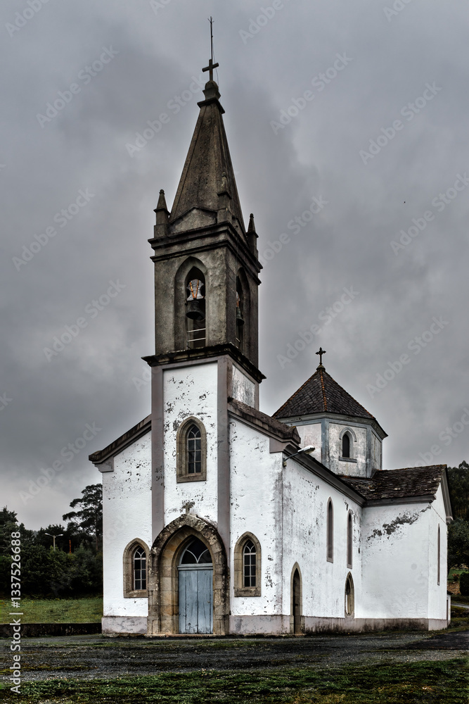 Fototapeta premium Old church with bell tower on a cloudy day
