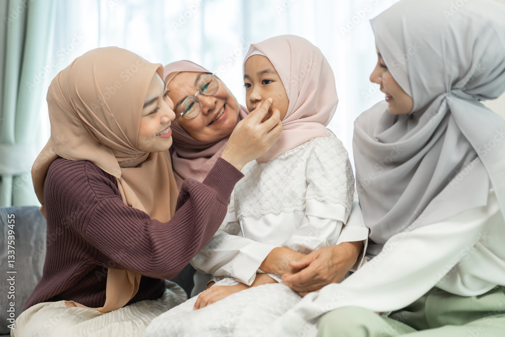 Obraz premium Four generations of muslim woman in hijab enjoying family time showing love, joy and happiness, grandmother, mother, daughters and granddaughter celebrating family traditions, togetherness and support