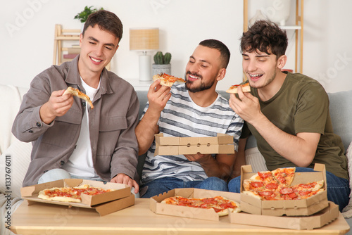 Male friends eating peppero...