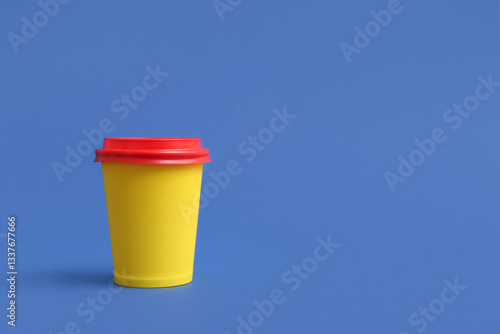 Bright yellow reusable coff...