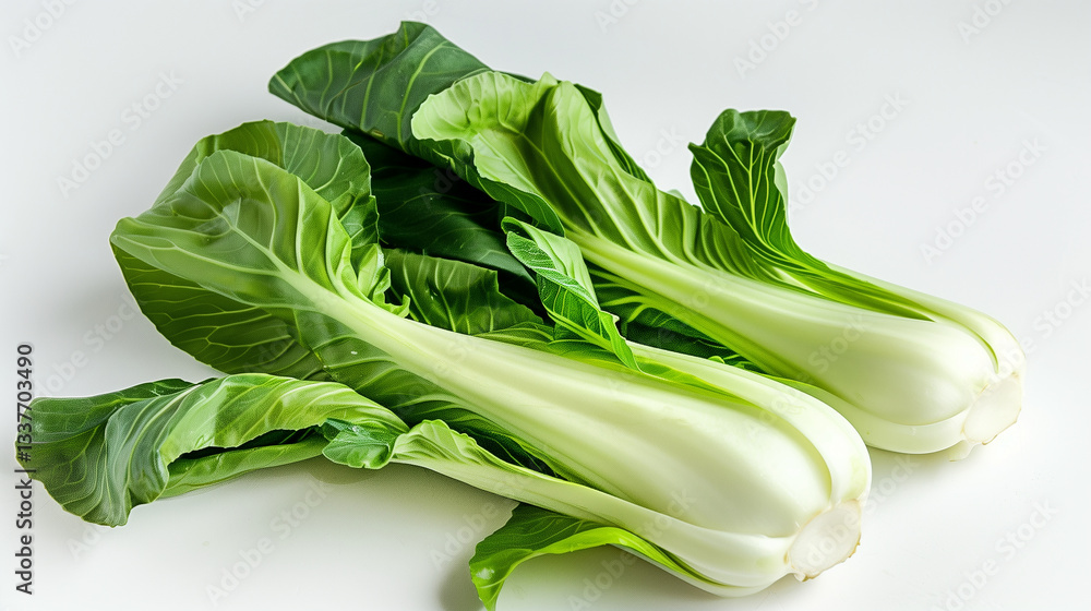 Three pieces of green broccoli are sitting on a white background. The broccoli is fresh and ready to be eaten Three pieces of green broccoli are sitting on a white background. The broccoli is fresh and ready to be eaten