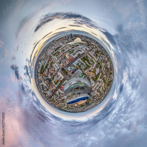 Aerial view of the Yekaterinburg city center with Vysotsky skyscraper. Beautiful landscape of a high-rise building with a rooftop pool and glass facade in Russia, Little planet sphere mode