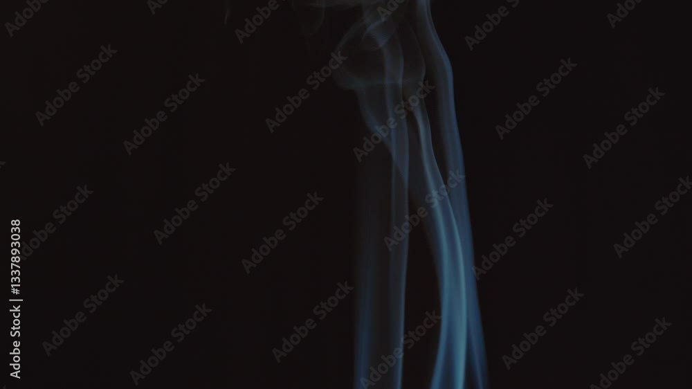 Peaceful fragrant incense smoke rises, black background, close up tracking, blurred focus Peaceful fragrant incense smoke rises, black background, close up tracking, blurred focus