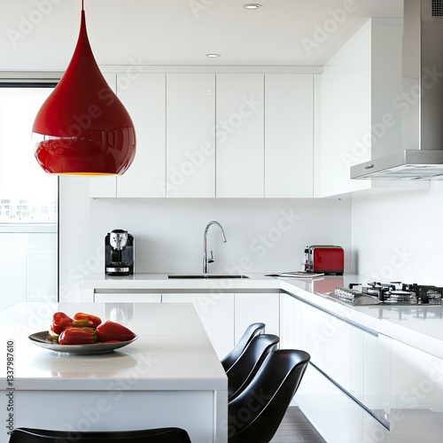 A contemporary kitchen with white cabinetry and a red pendant light.