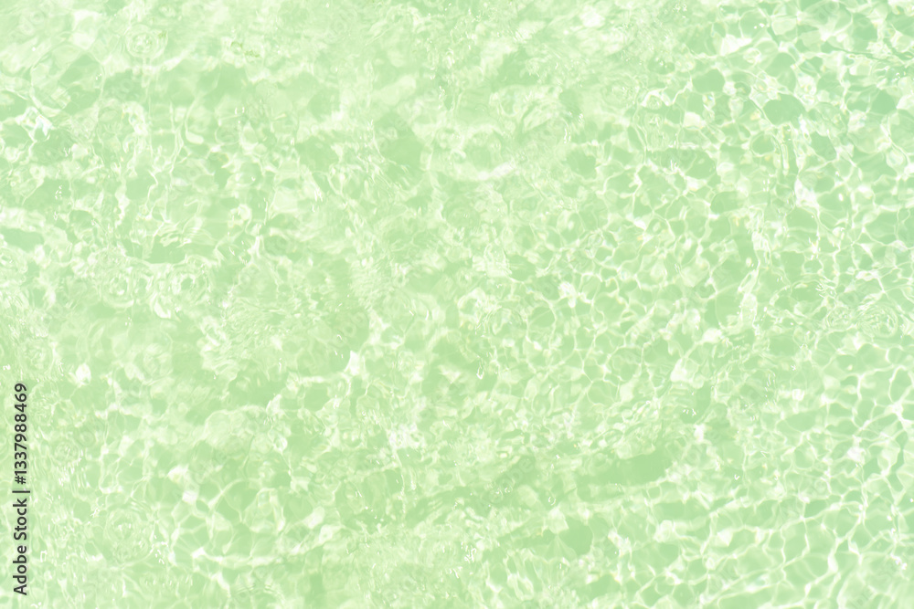 Blue water with ripples on the surface. Defocus blurred transparent blue colored clear calm water surface texture with splashes and bubbles. Water waves with shining pattern texture background. Blue water with ripples on the surface. Defocus blurred transparent blue colored clear calm water surface texture with splashes and bubbles. Water waves with shining pattern texture background.