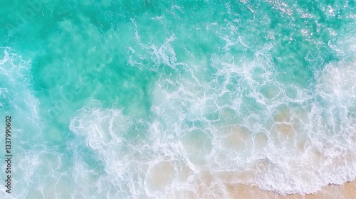Ocean Waves' Dance: An aerial perspective reveals the mesmerizing dance of turquoise waves meeting the golden shore, inviting viewers into a world of tranquility.