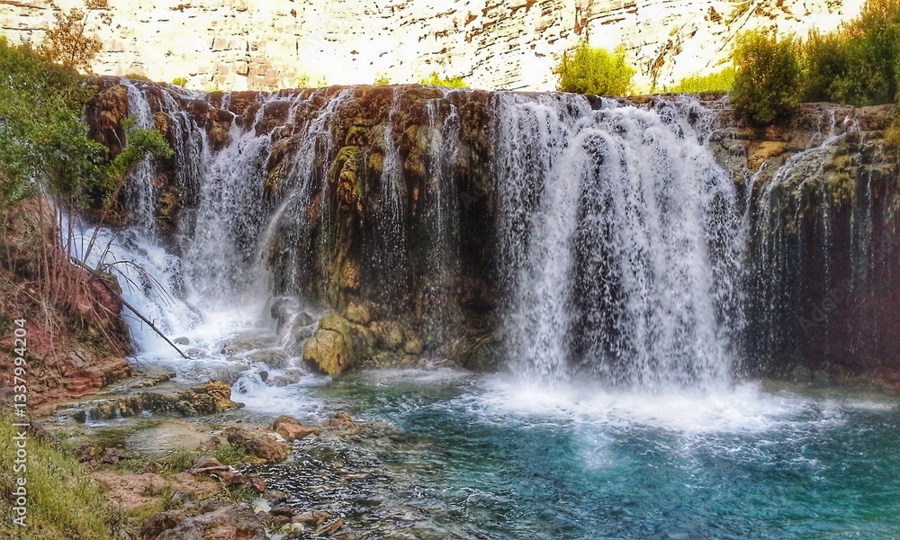 Fototapeta premium waterfalls of Havasupai located in a side canyon of the Grand Canyon within the Havasupai Indian Reservation