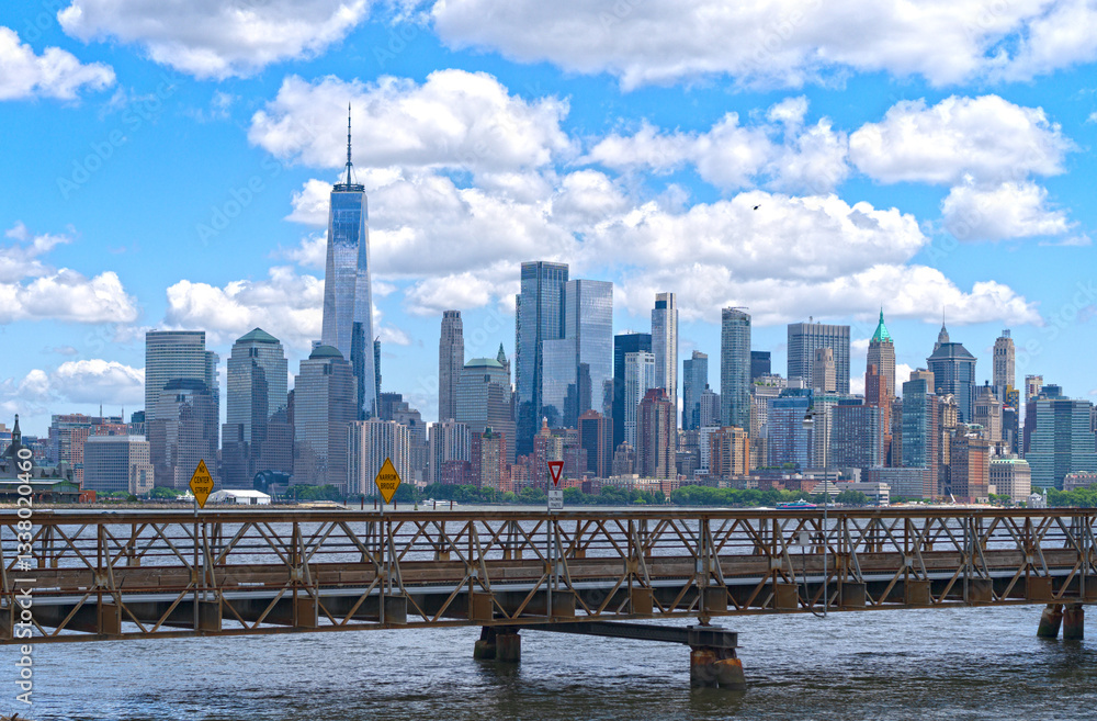 Naklejka premium New York City. NYC cityscape with skyscrapers. Panoramic of New York City skyline. Manhattan skyline. New York and Hudson River. Downtown NYC. New York skyscrapers. The business district of NYC.