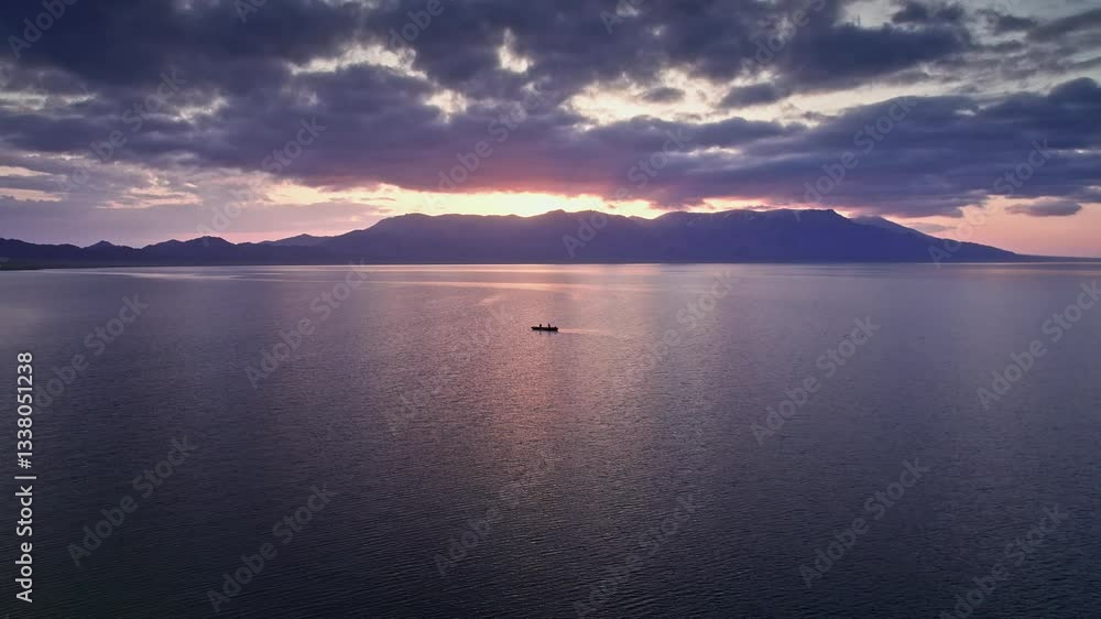 4k Video Sayram Lake Fishing Boat at Sunset Over Calm Waters in Kazakhstan 4k Video Sayram Lake Fishing Boat at Sunset Over Calm Waters in Kazakhstan