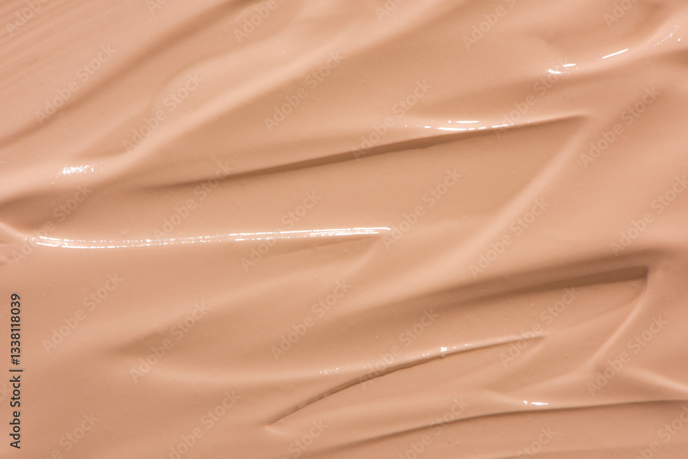 Makeup foundation texture swatch. BB cream, concealer, paint smear background.