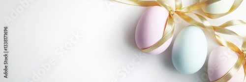 Three Pastel Eggs With A Ribbon Arranged In Sheer Grace