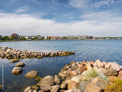Hellerup Oresund coastline with breakwaters, waterfront homes and coastal protection north of Copenhagen, Denmark