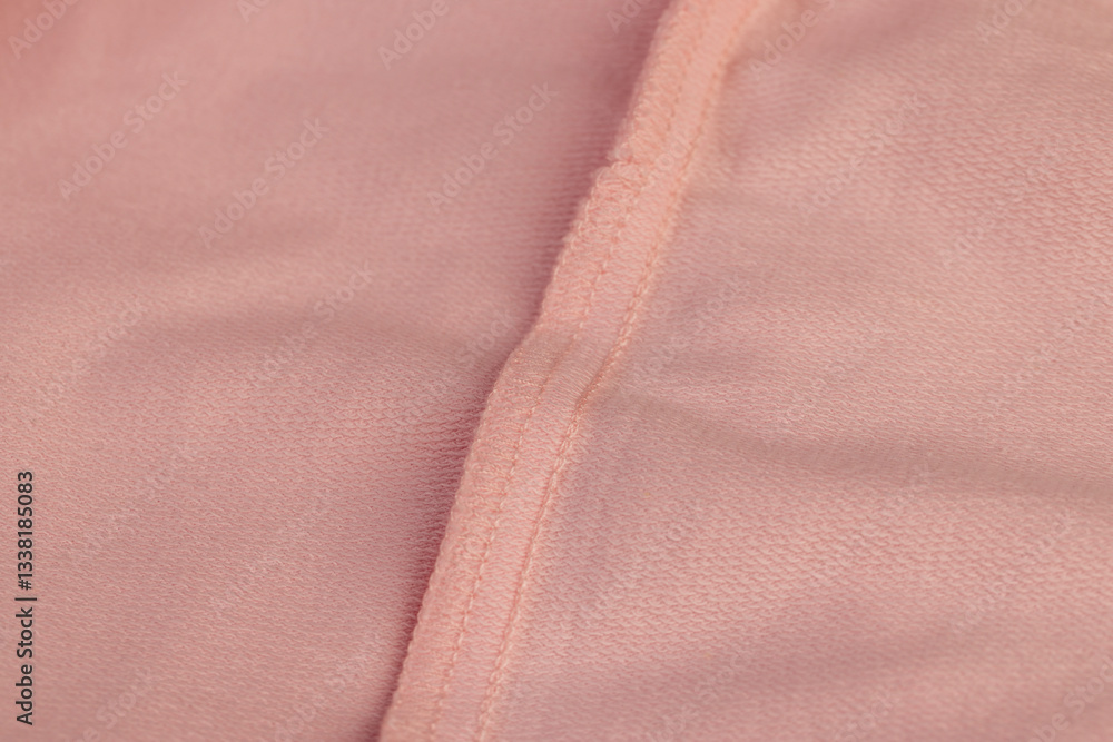 Fototapeta premium details of a part of the pink fabric that is used to make clothes