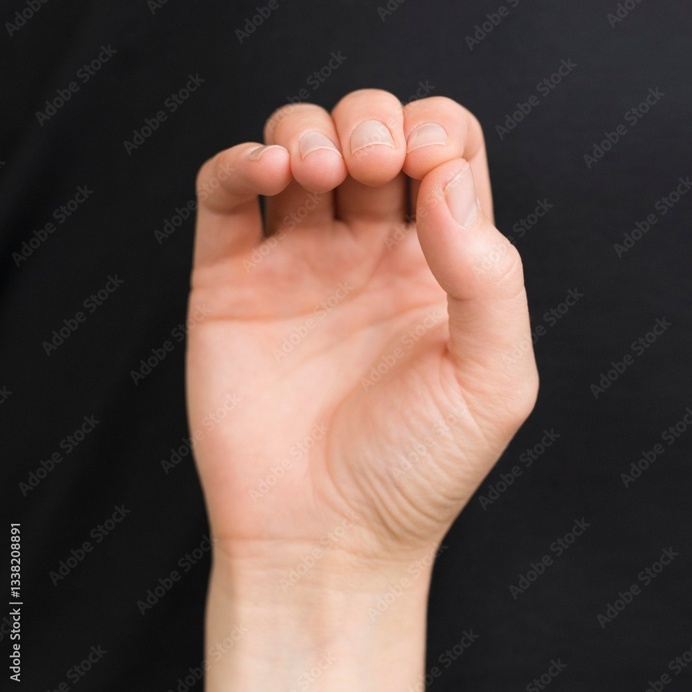 Obraz premium hand on the black background
