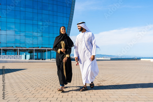 Photography Middle-eastern beautiful couple wearing traditional clothing dating outdoors - A