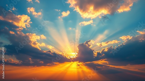 Fototapeta Naklejka Na Ścianę i Meble -  Sunset sky with sunbeams streaming through layers of clouds