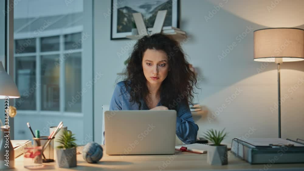 Businesswoman reviewing laptop information making notes. Closeup late manager Businesswoman reviewing laptop information making notes. Closeup late manager