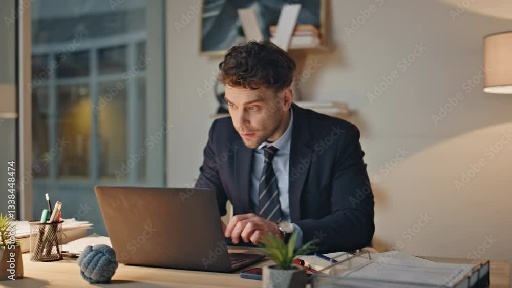 Overjoyed manager working laptop receiving great news in email at office closeup Overjoyed manager working laptop receiving great news in email at office closeup