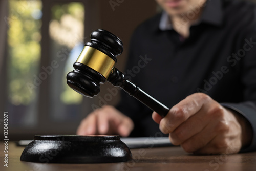 Wallpaper Mural judge's gavel in hand judges is placed on a table in the legal counsel's office Torontodigital.ca