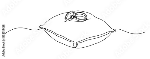 wedding rings on a soft pillow thin line abstract expression