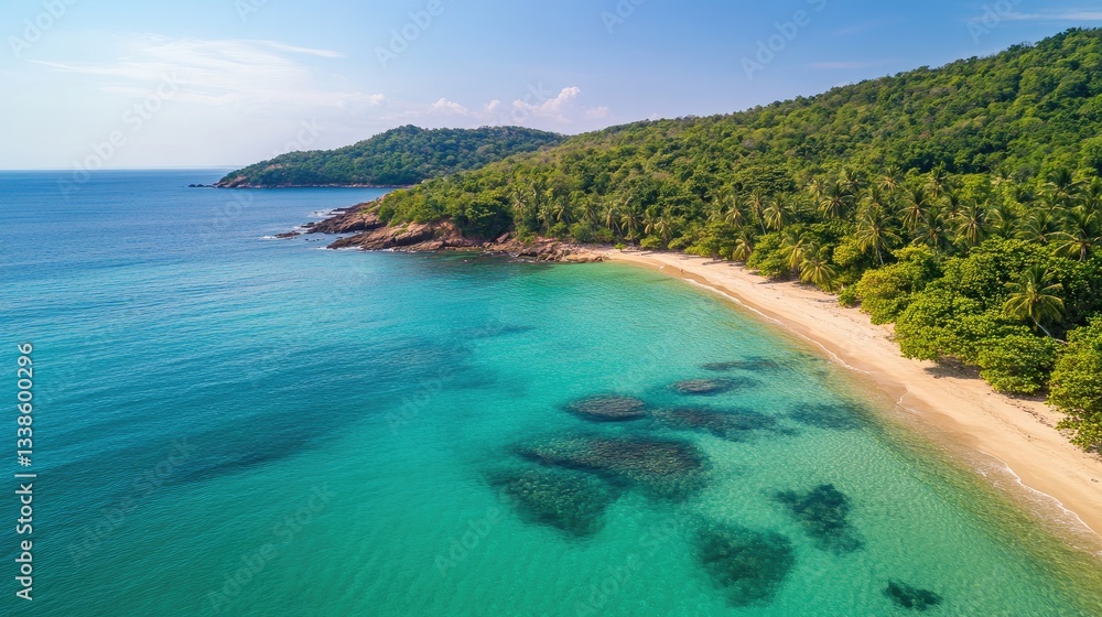 Fototapeta premium Tranquil Tropical Beach with Clear Waters and Lush Greenery View