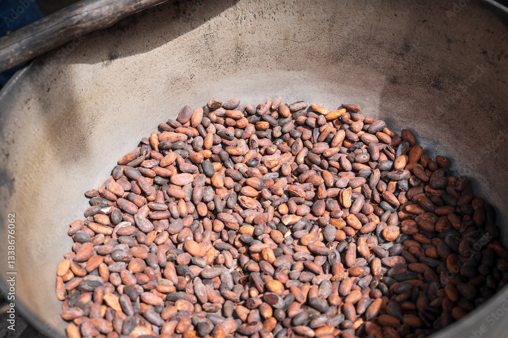 Roast cocoa beans in a