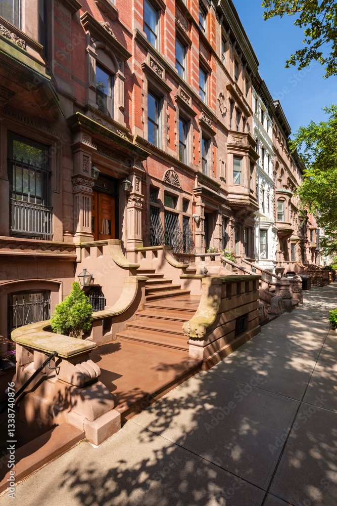 Fototapeta premium Manhattan brownstones and townhouses with entry steps. Upper West Side Central Park West Historic District, New York City