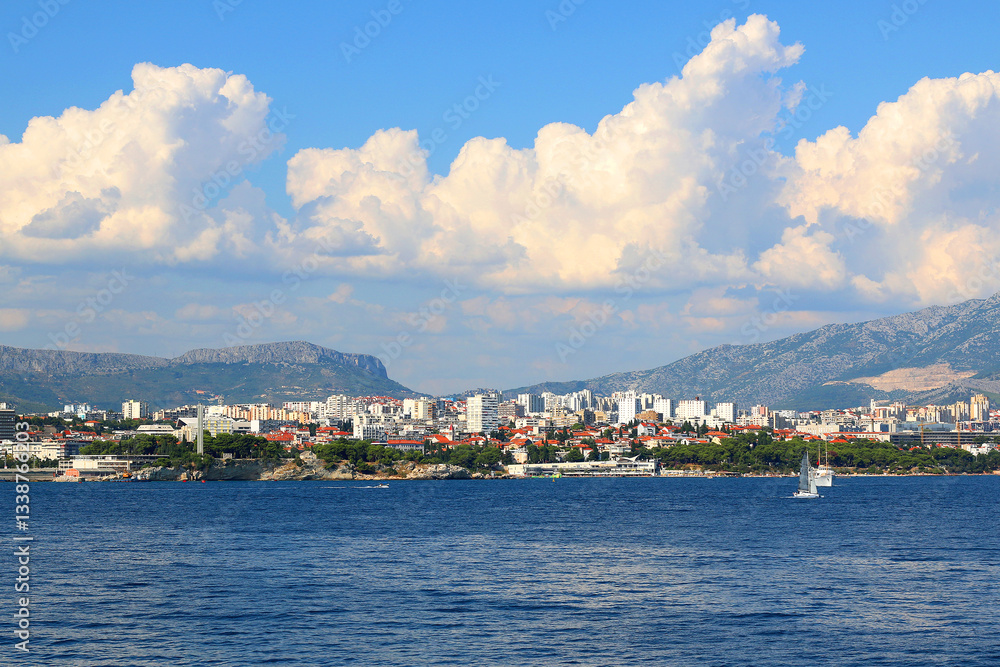 Contemporary buildings, gardens and beaches at the waterfront in Split, Croatia. View of Split from the boat.