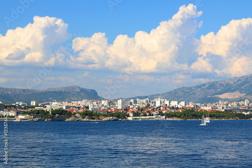 Contemporary buildings, gardens and beaches at the waterfront in Split, Croatia. View of Split from the boat.