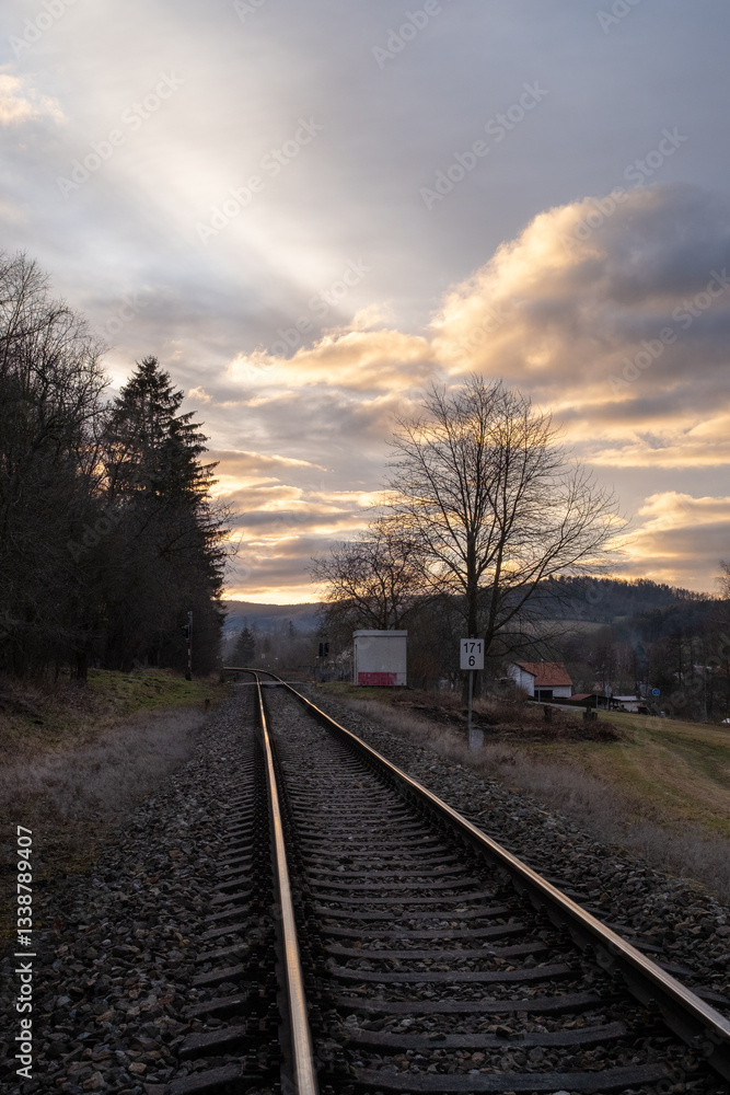 Railway Tracks Leading to the Horizon at Sunset Railway Tracks Leading to the Horizon at Sunset