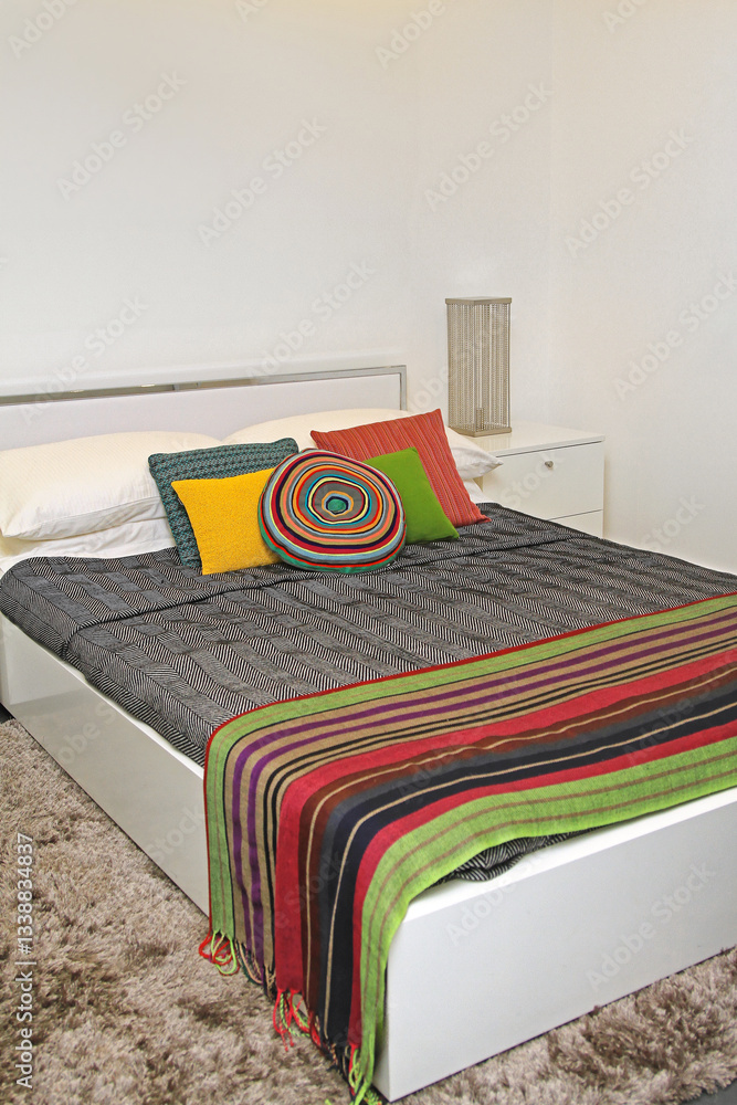Many Pillows in Bed White Bedroom With Shag Rug Modern Home Interior