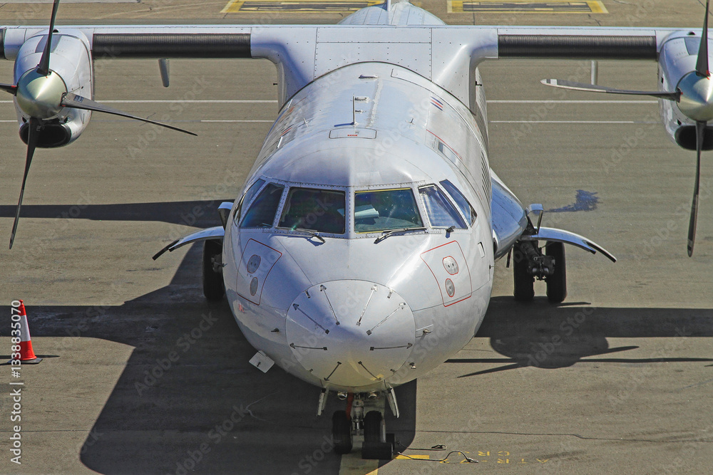 Front View of Turbo Propeller Airplane Dock at Airport
