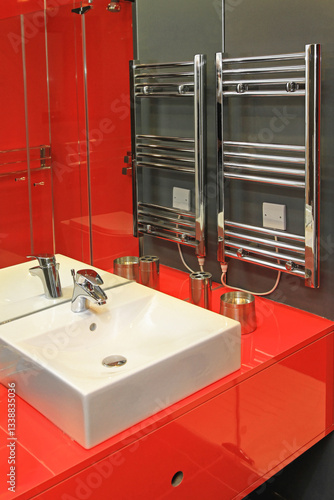 Obraz na płótnie Stainless Steel Towel Warmer Electric Heater in Red Bathroom Modern Home w salonie