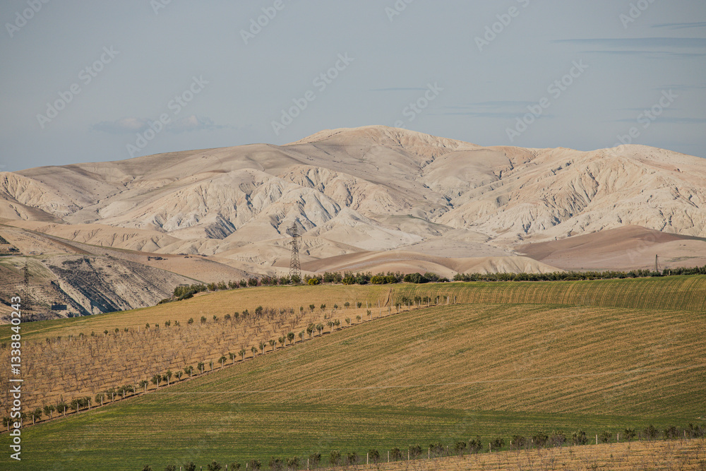 Obraz premium Mountains in Morocco. Travel destination in Africa. Vacation trip. Moroccan culture. Summer holiday. North Africa. Mountain landscapes. Desert soil