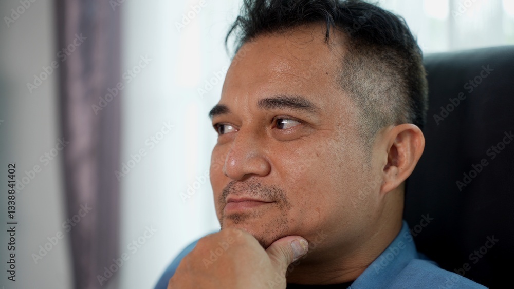 Fototapeta premium Asian Businessman show his face with emotion in Modern Office