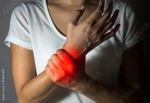 Female suffering with wrist pain