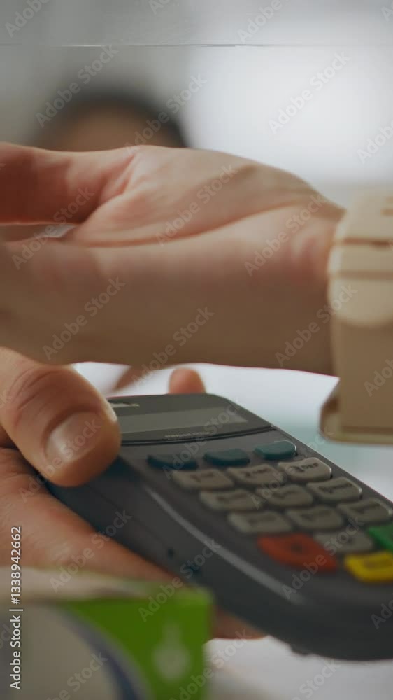 A modern young girl is completing an online payment for pills at a pharmacy using her smartwatch. The transaction occurs in a busy pharmacy setting, showcasing convenient technology A modern young girl is completing an online payment for pills at a pharmacy using her smartwatch. The transaction occurs in a busy pharmacy setting, showcasing convenient technology