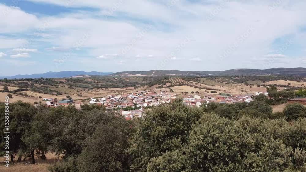 Aerial Drone Shot Over Quercus ilex Trees Revealing Horcajo de los Montes Village - 638
Aerial Drone Shot Over Quercus ilex Trees Revealing Horcajo de los Montes Village - 638