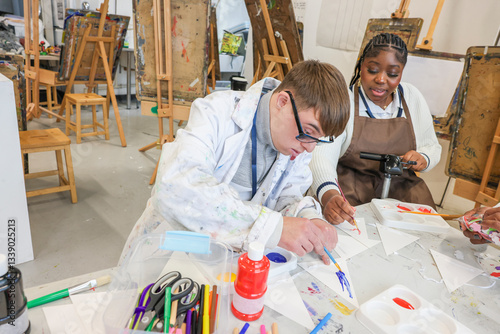Disabled people in creative workshop
