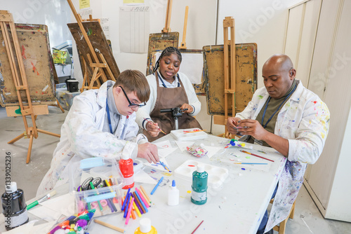 Disabled people in creative workshop