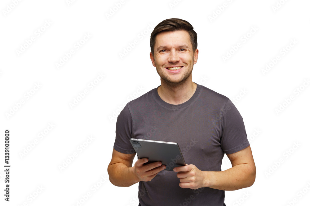 Man smiling while holding a tablet in a bright indoor setting, showcasing a friendly demeanor and engagement with technology Man smiling while holding a tablet in a bright indoor setting, showcasing a friendly demeanor and engagement with technology