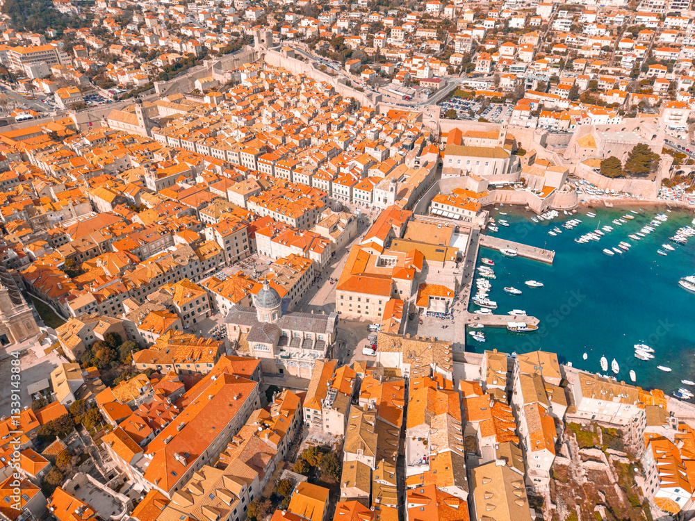 Fototapeta premium Aerial panorama of old town of Dubrovnik and clear turquoise Adriatic Sea. Travel background
