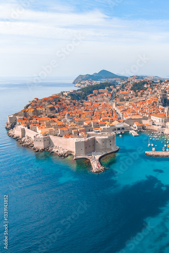 Vertical touristic background of Dubrovnik old town, Croatia from drone