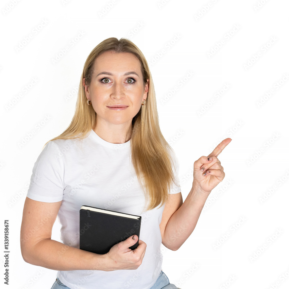 Young blonde business woman wear white shirt white t-shirt writing down in notebook diary remind memories make list dreams isolated on white background studio People lifestyle concept Young blonde business woman wear white shirt white t-shirt writing down in notebook diary remind memories make list dreams isolated on white background studio People lifestyle concept