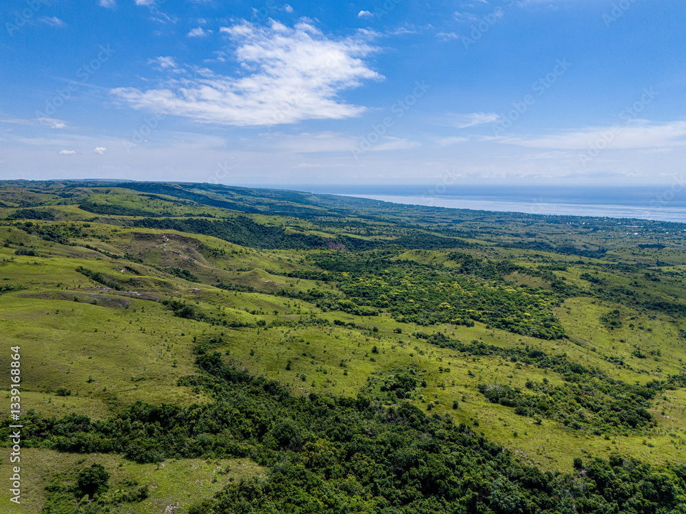 Obraz premium East Sumba, East Nusa Tenggara , Indonesia – 03. 30. 2024 – Waingapu City as seen from the western hills of the city