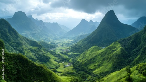Breathtaking green valley surrounded by majestic mountains in ha giang, vietnam