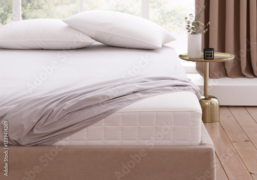 Bedroom with window, wooden floor, double bed with mattress, covered by fitted sheet, two pillows and bedside table. Corner of mattress is visible. Front top view. Suitable for mockup